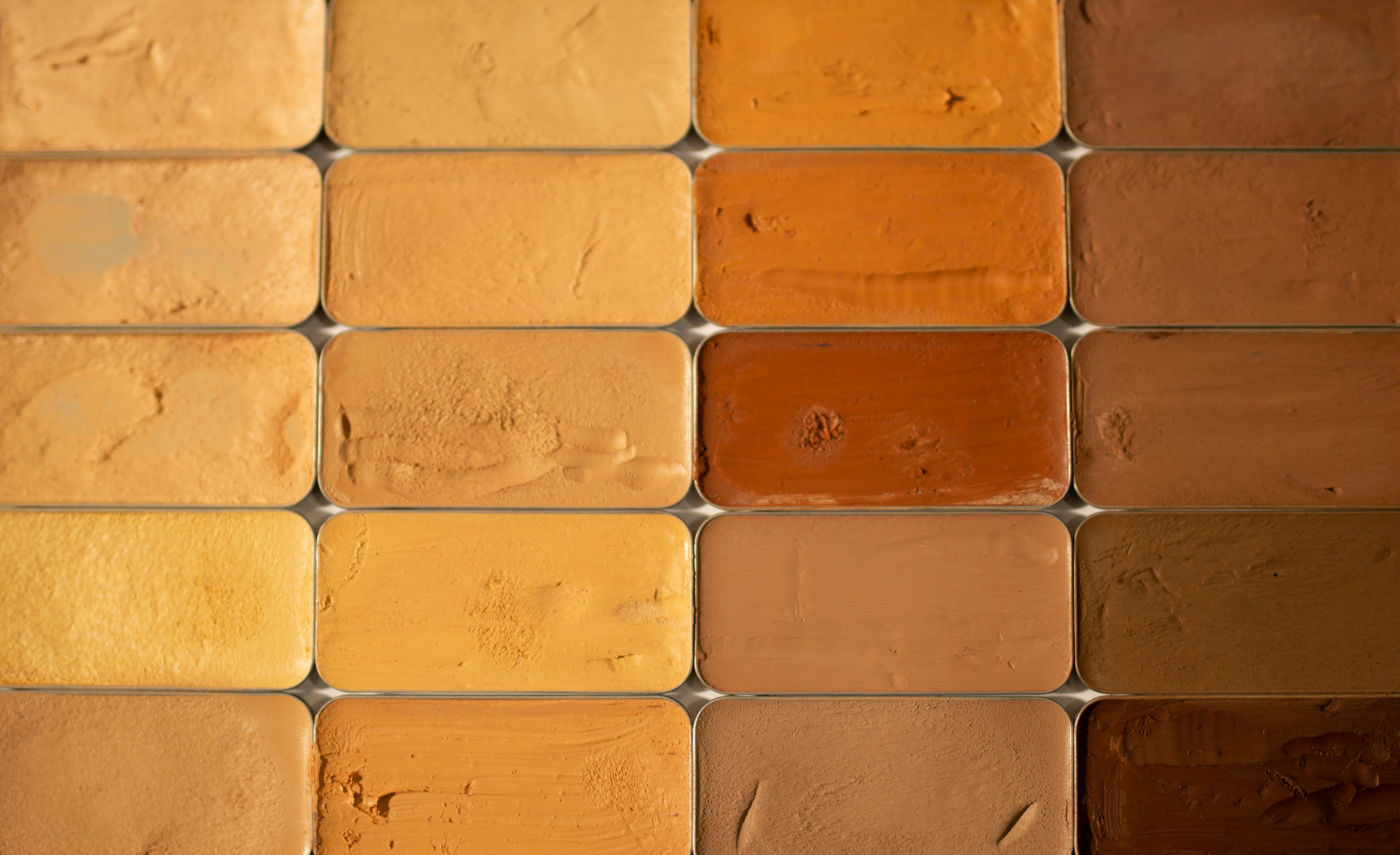 A worked palette of watercolour pans